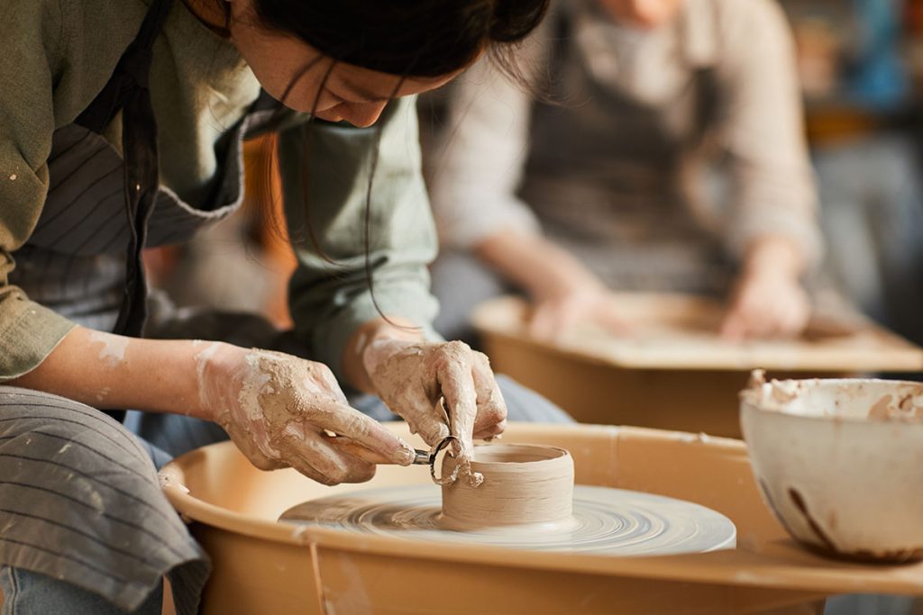 shaping-wet-clay-on-pottery-wheel-2022-02-08-22-39-25-utc-copy.jpg